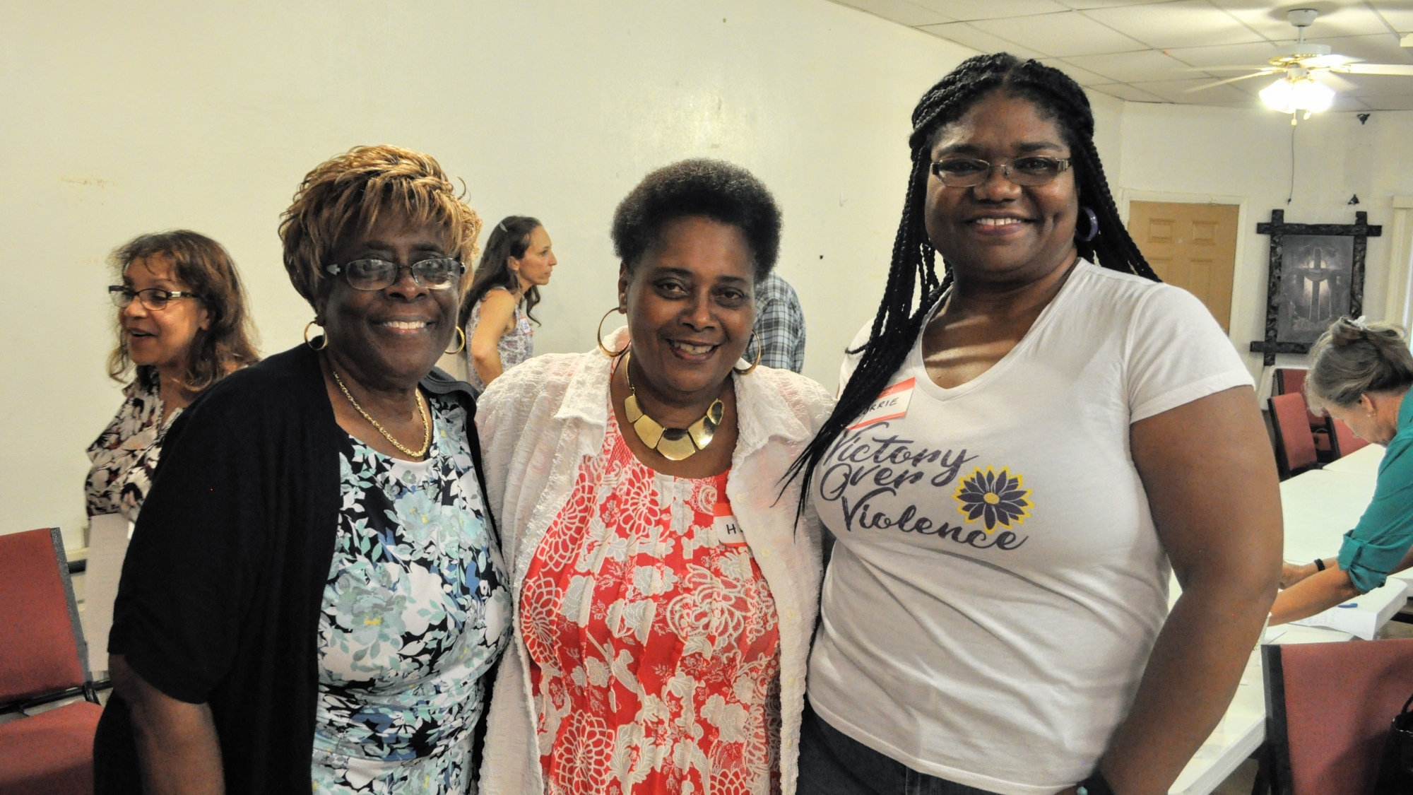 Pastor Jo Thomas from Community Bible Church, Helen Neal-Ali from SRQ Strong, and Lorrie Simmons from Victory over Violence. Photo courtesy of Andrea Blanch.